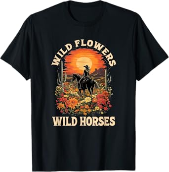 western sunset cowgirl riding horse wild flowers wild horses T-Shirt