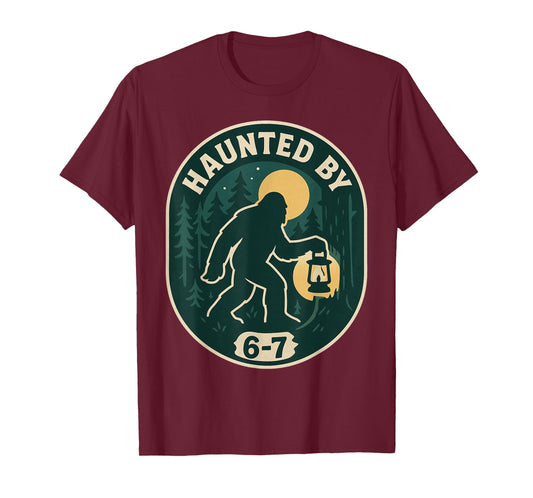Haunted by 6-7 Bigfoot Lantern Halloween Badge T-Shirt