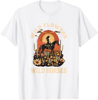 western sunset cowgirl riding horse wild flowers wild horses T-Shirt