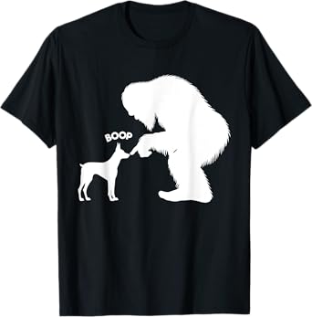 DesignDorks Unisex-Adults Funny Bigfoot Sasquatch Doberman Pinscher Boop Black Short Sleeve Classic Fit Cotton Blend T-Shirt