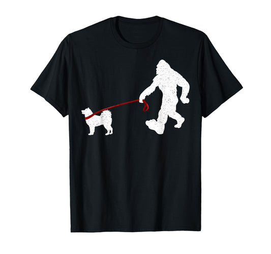 Funny Bigfoot Walking with Alaskan Malamute Dog Lover T-Shirt