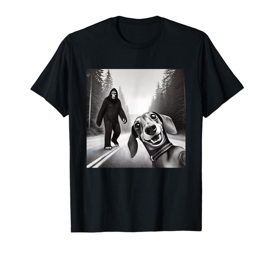 Comical Dachshund Encounters Mythical Creatures Unisex T-Shirt - Bigfoot And Dachshund On Road - Black - Small - Short Sleeve